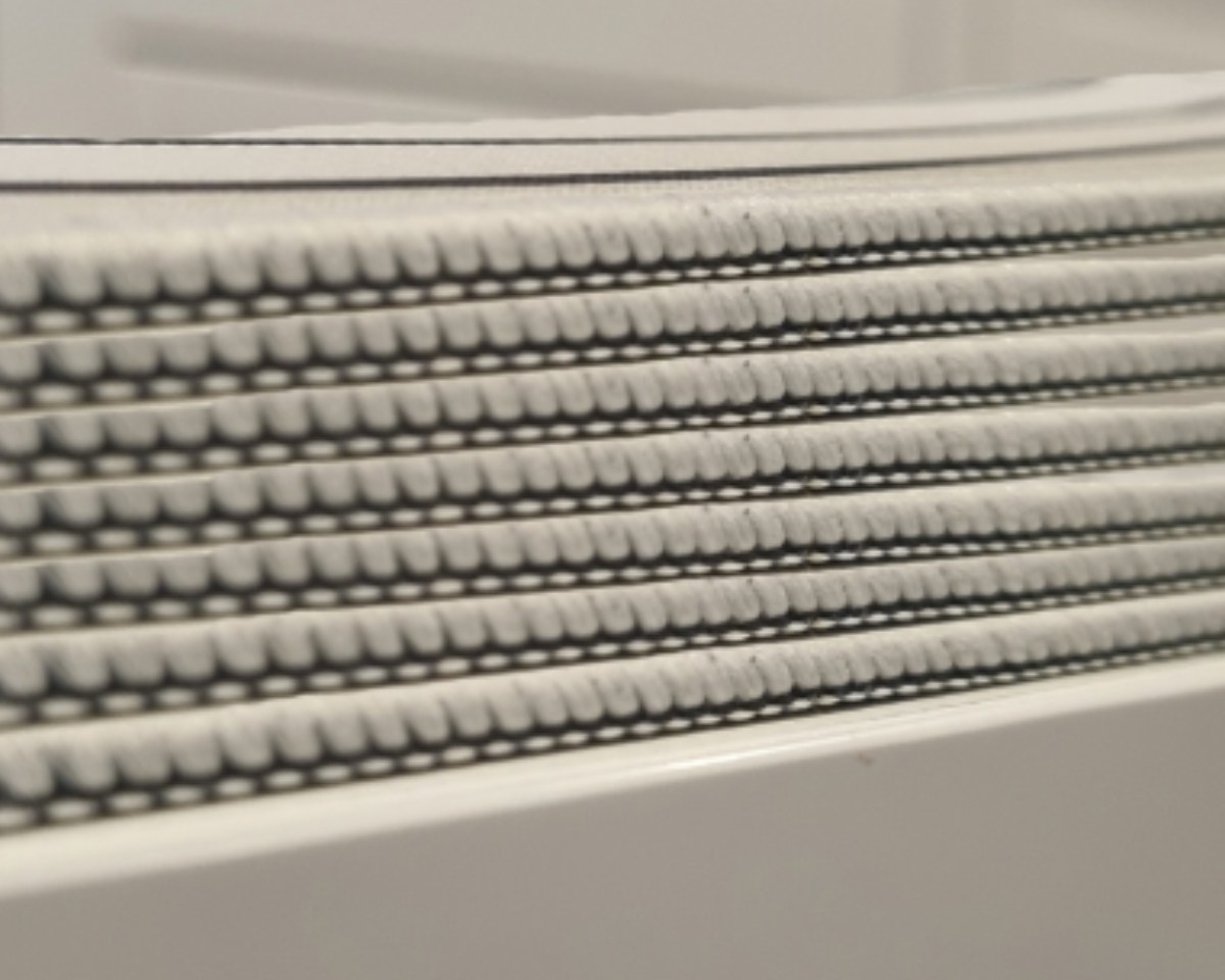 Close-up of the stitched edge and woven surface